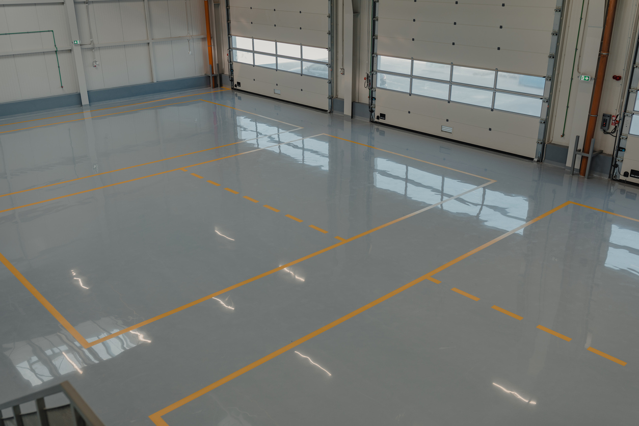 Industrial shop floor with epoxy coating and safety striping in Boise, Idaho